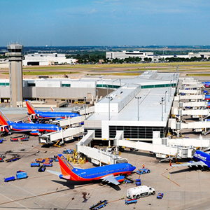 love field moderization projects terminal gate exterior with airplanes